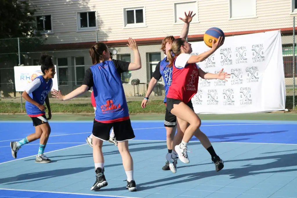Youths playing Basketball