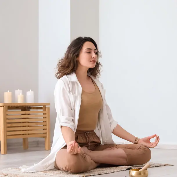 Headshot of a person enjoying a Yoga pose.