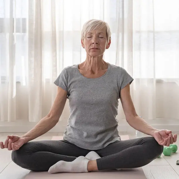 Headshot of a person enjoying a Yoga pose.