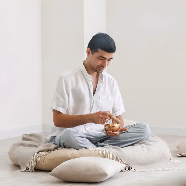 Headshot of a person enjoying a Yoga pose.