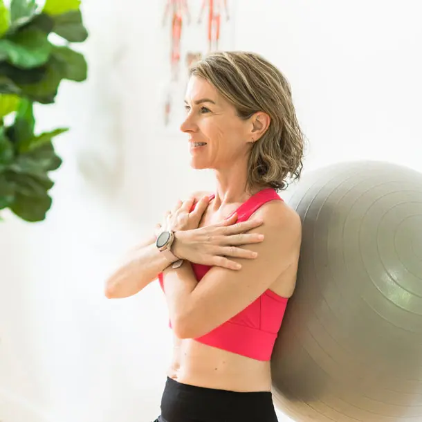 Headshot of a person enjoying a Yoga pose.